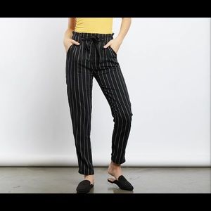 Paper bag waist pants.